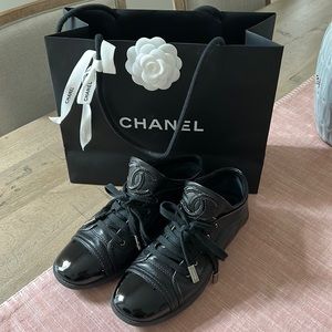 Beautiful like new Authentic Chanel runners.  Size 7.